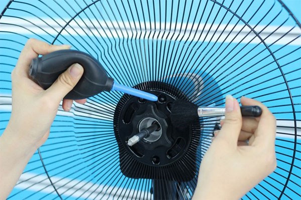 Use a brush to clean the crevices of the fan