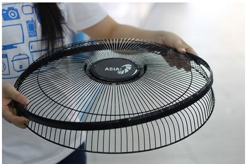 Install the fan bezel on the front fan cage